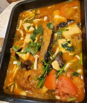 Grilled fish in tomato broth at Lotus Vegetarian 莲心 - Novena in Central Singapore