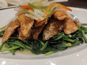 fried golden dumplings on stir fried spinach at Lotus Vegetarian 莲心 - Novena in Central Singapore