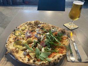 Vegan pizza with artichokes  at MadreLievito in Barcelona
