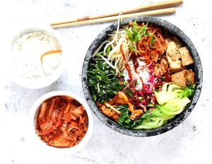 BIBIMBAP (VEGAN, G/F)
KOREAN STYLE BIBIMBAP BROWN RICE GLOBOWL WITH A PERIMETER OF SAUTÉED CARROTS, EDEMAME, BOK CHOY, MUSHROOMS, BEAN SPROUTS & KIMCHI. TOPPED WITH TOFU CUBES. at Globowl Cafe in Lexington
