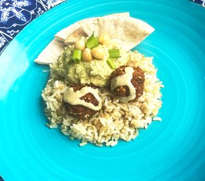 FALAFELS OVER TOUN INSFUED RICE W/ HUMMUS & FLATBREAD (VEGAN)
FALAFELS OVER TOUN INFUSED BROWN RICE, TOPPED WITH TAHINI & ACCOMPANIED BY KALE / CHICKPEA HUMMUS AND FLATBREAD. 
 at Globowl Cafe in Lexington
