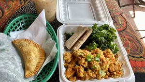 Mushroom empanada, Buddha bowl, chai latte  at Globowl Cafe in Lexington