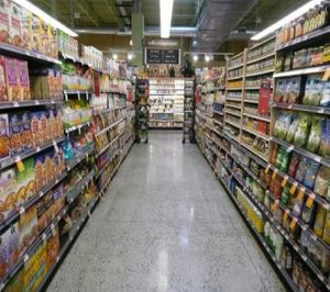 Looking down an aisle at Whole Foods Lake Grove at Whole Foods Market in Lake Grove