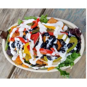 Grilled Sweet Potatoes and trio bell peppers with Seasoned Black Beans served with rice, quinoa, as a wrap, or salad. at The Hungry Hatch in Kansas City