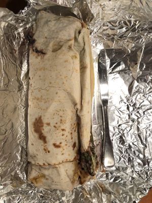 Knife to show scale of “baby” Gordito sans dairy  at Gorditos in Seattle