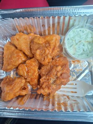 Buffalo Tempeh wings. I already ate the celery😁 at Kaya's Kitchen in Belmar