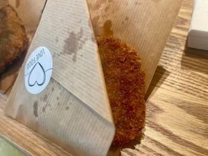 Delicious, crispy seitan snack. It was slightly salty, a perfect combination with the sweet, caramel-like tea they served. (Vegan Food Tour July 13, 2025) at Veggie Garden in Rotterdam