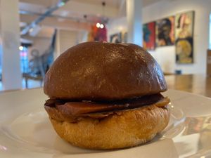 Vegan bacon bap made with a vrioche bun and This Isn't Bacon. at Matthews Yard in Croydon