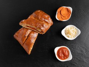 Vegan pepperoni calzone is available now! at Sarpino's Pizzeria in Fort Lauderdale