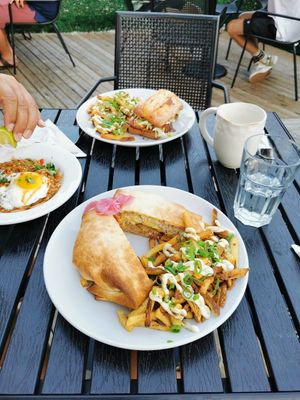 Vegan Hawaiian plate lunch crunch wrap, vegetarian pad Thai, and vegetarian grinder sandwich at Hopyard in Charlottetown