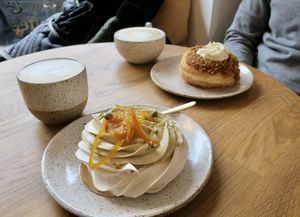 Pavlova with pistachio creme and hazelnut donut   at Eter Vegan Bakery in Warsaw