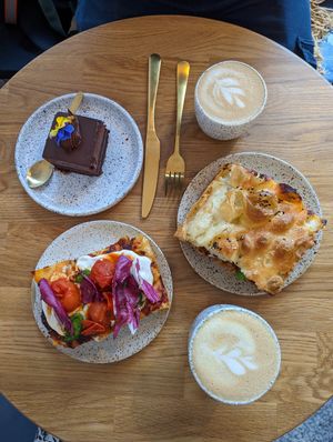 Pesto and tomato focaccia and an OKONomiyaki sandwich at Eter Vegan Bakery in Warsaw
