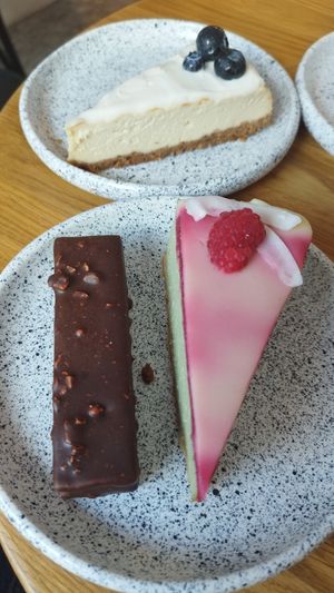 Twist, blueberry cheesecake, matcha raspberry cake at Eter Vegan Bakery in Warsaw