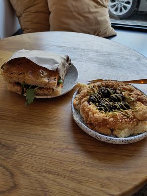 BLT vegan foccacia (with baked eggplant) and wild berries + pistacchio brioche at Eter Vegan Bakery in Warsaw