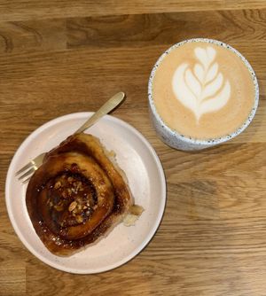 Sticky almond pastry & rose latte   at Eter Vegan Bakery in Warsaw
