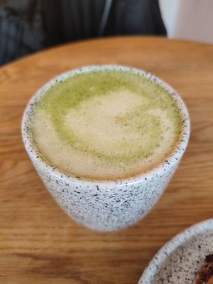 matcha latte 💜🩷 at Eter Vegan Bakery in Warsaw