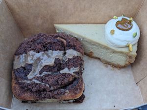 Chocolate roll and pistachio cheesecake at Eter Vegan Bakery in Warsaw