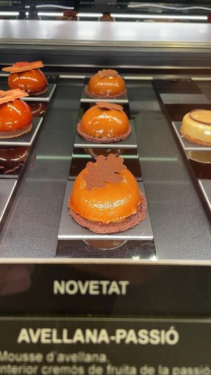 Individual cake hazelnut pasión fruit  at La Pastisseria in Barcelona