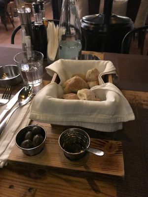 Bread Basket with Olives and Olive Oil at Ejona in Tirana