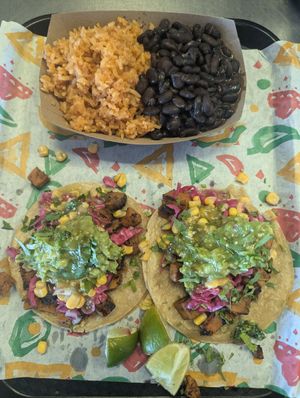 Sweet potato and mushroom tacos with side of rice and beans at Tacochela in Downers Grove