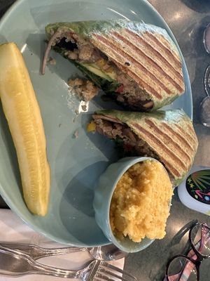 Vegan Mexican burrito in a spinach wrap with vegan grits   at get REAL cafe in Sturgeon Bay