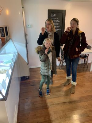 Happy customers tasting ice creme  at Moo-Over in Columbia City