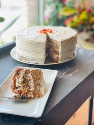Carrot Cake
Check out the cake that is available by slice at the shoppe also can order online for whole cake
All made from scratch.  Completely Vegan and gluten free at Moo-Over in Columbia City