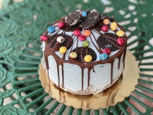 Ice cream cakes, brownie bottom. Various flavors available in shoppe, also order online.All made from scratch.  Completely Vegan and gluten free
 at Moo-Over in Columbia City