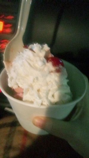 Black cherry and mint chip vegan ice cream with almond whip and a cherry. at Freshie's Ice Cream in Lexington