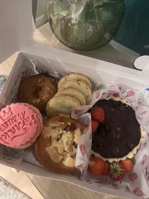 Sweet box including a lotus doughnut (to die for!) lemon cookies, cupcake, fruit cake, chocolate tart and strawberries   at My Lavender Kitchen in Sittingbourne
