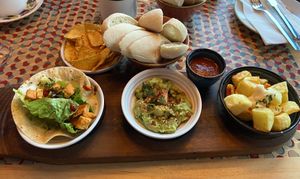 Sweet potato taco, guacamole, potatoes bravas. Served with tortilla chips and sliced ciabatta   at Lounges - Sentado Lounge in Sittingbourne