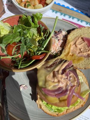 Beyond meat burger with vegan patatas bravas  at Lounges - Sentado Lounge in Sittingbourne