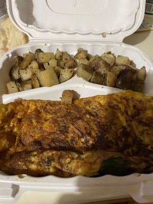 Vegan sausage, egg, peppers, spinach and cheese omelet with hash browns  at JMT Vegan Eats in Virginia Beach