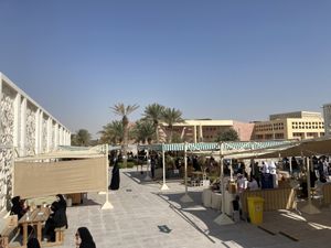 Stalls and seating  at Torba Farmers Market  in Doha