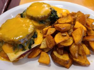 Vegan eggs Benedict with potato wedges at Cheezy Vegan in Woodlyn