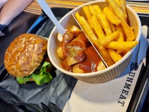 Special Burger and Currybanger. My non-vegan friend felt in love with the burger. at UNMEAT in Zurich