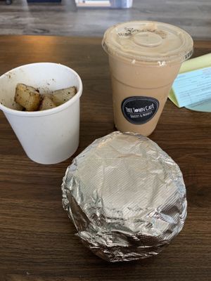 Sandwich, snickerdoodle latte and vegan home fries   at Tree Town Cafe in Penfield