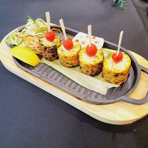 Masala corn on cob (vegan) at YARANA  in Central Singapore