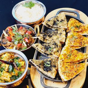 Olive naan and spicy naan. Love the spicy naan. Also mushroom dish and tofu dish at the side (vegan side) at YARANA  in Central Singapore