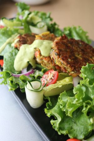 “Crab” Cakes and Sour Corn

Heart of palm and artichoke “crab” cakes, mixed peppers, cashew sour cream, toasted farro, sun-dried tomato paste, sour corn at The Vegan Club in Cleveland