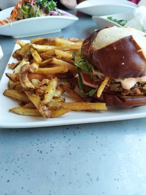 Crab burger and fries at The Vegan Club in Cleveland