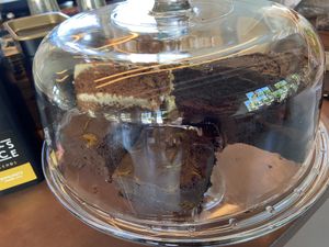 Different pies: carrot cake, lemon pie, choco pie and brownie  at Mama Gaia in Haarlem