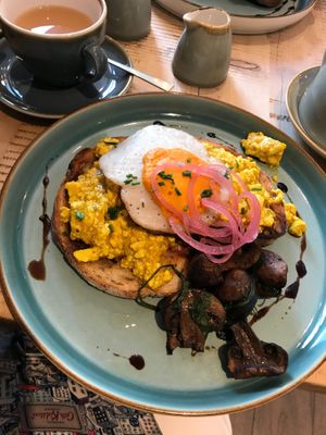 Tofu scramble in sourdough toast, garlicky spinach mushrooms and vegan egg - amazing! at The Vibe in Liverpool