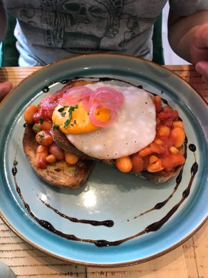 Home-made beans on sourdough toast with vegan egg. at The Vibe in Liverpool