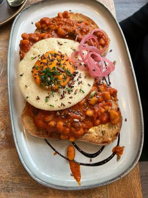 beans on toast w/ vegan “egg"  at The Vibe in Liverpool