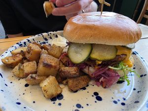 Burger and cubed potatoes. at The Vibe in Liverpool