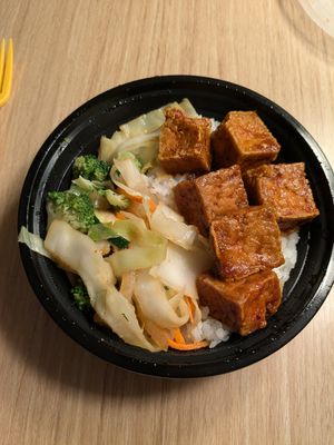 Spicy teriyaki tofu bowl with white rice and veggies at Teriyaki Madness in Great Falls