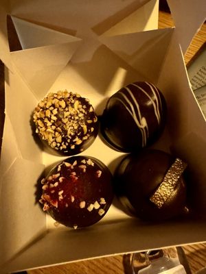 Flødebollers before the plane trip smooshed them  at Glean - Torvehallerne in Copenhagen