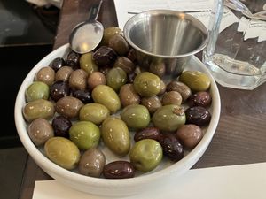 Marinated olives come in their standard portion size even for aperitivo hour (M-Th 5-6p)  at Fiorella in San Francisco