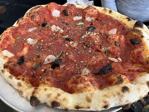 Thin-crust Neapolitan pizza (12”) is intended for one  at Fiorella in San Francisco